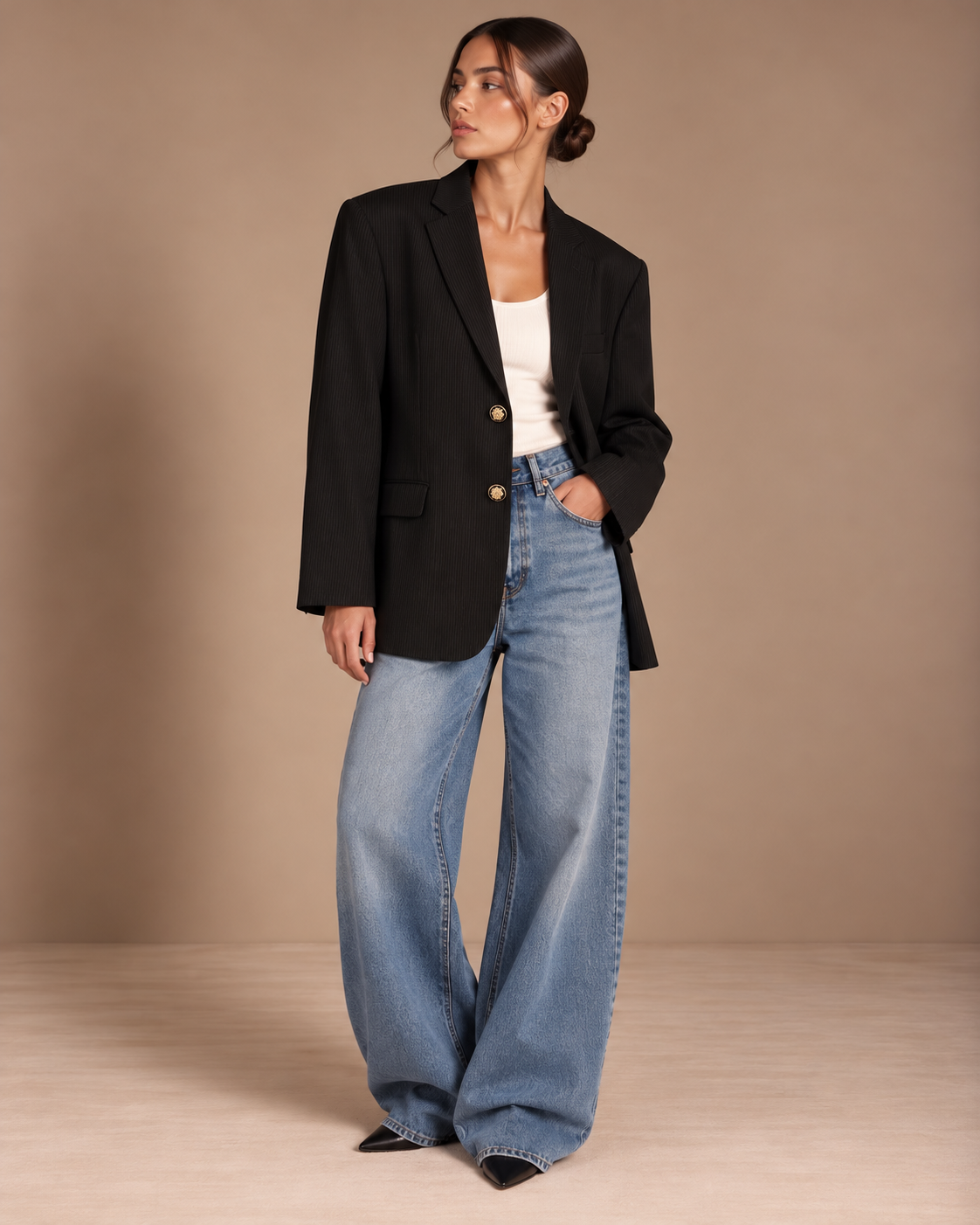 Vintage oversized black pinstripe blazer with gold buttons worn with white tank and wide-leg jeans