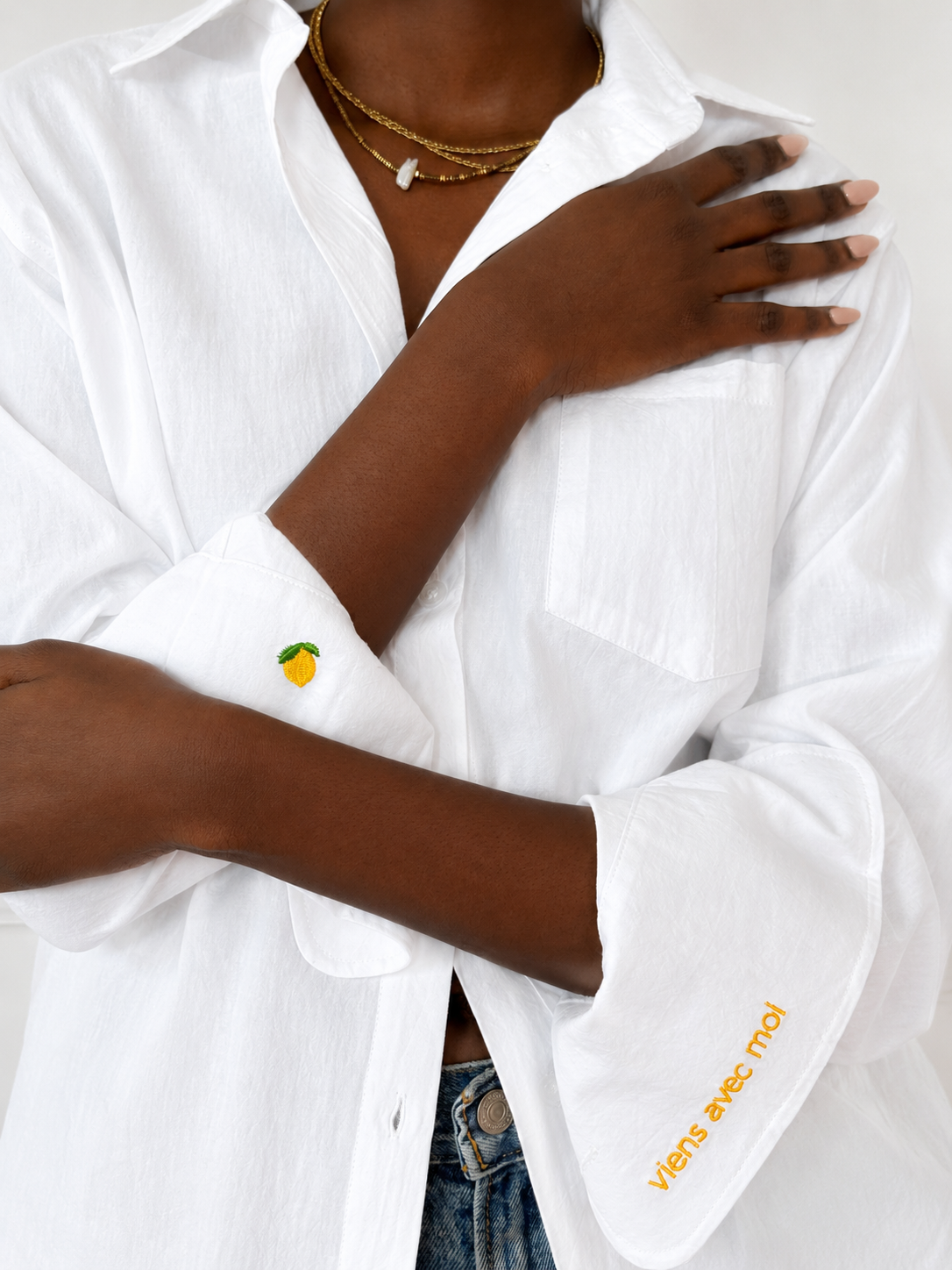 White embroidered cotton Everyday Boyfriend Shirt with lemon cuff detail.