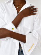 White embroidered cotton Everyday Boyfriend Shirt with lemon cuff detail.