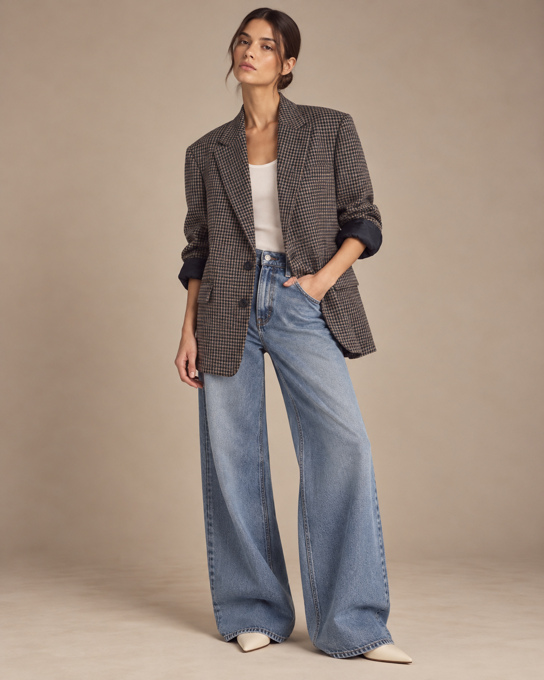 Vintage oversized navy and camel check blazer worn with white tank and wide-leg jeans